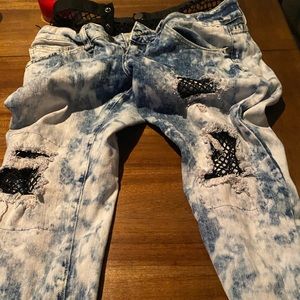 Ripped fishnet jeans